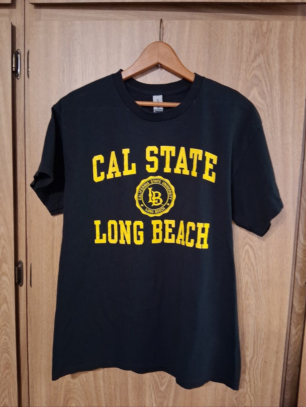 Black T-Shirt with Yellow Cal State Long Beach Graphic